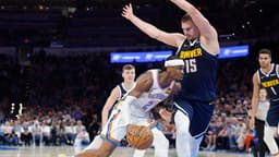 Mar 10, 2025; Oklahoma City, Oklahoma, USA; Oklahoma City Thunder guard Shai Gilgeous-Alexander (2) drives against Denver Nuggets center Nikola Jokic (15) during the second half at Paycom Center.