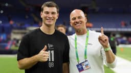 Indiana quarterback Fernando Mendoza (QB11) poses with former Seattle Seahawks quarterback Matt Hasselbeck during the NFL Scouting Combine at Lucas Oil Stadium.